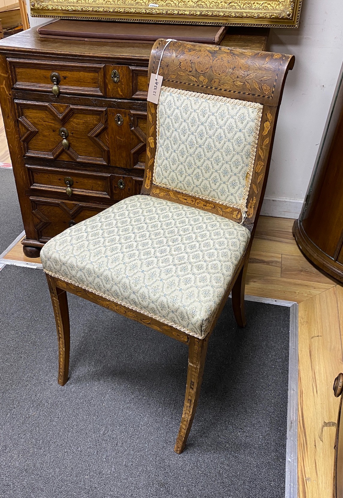 An early 19th century Dutch floral marquetry dining chair